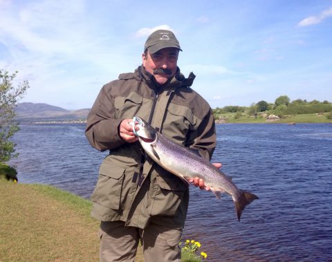 Jean Jacques Daurat, France, with one of his two Cloongee salmon caught on the Lake River .
