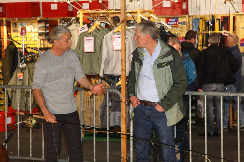 Uwe Rieder (left) explains how to cast with a double handed fly-rod.