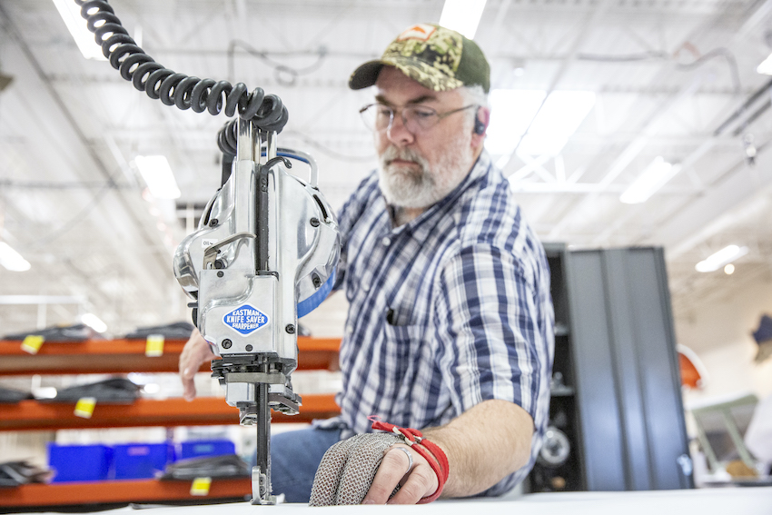 With many other local businesses and individuals already hard at work producing masks, Simms shifted its focus to design, develop, and begin manufacturing medical gowns for hospital personnel and staff.
